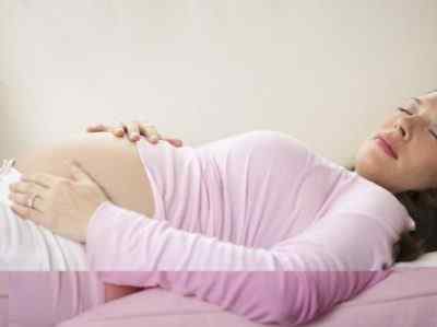 Почему болит голова во время беременности