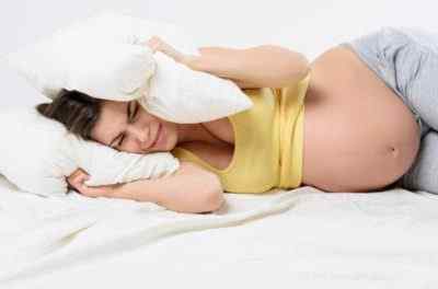 Почему голова болит при беременности